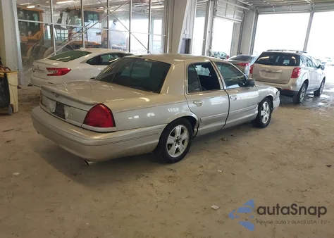 2004 Ford Crown Victoria Lx z USA, uszkodzony, nr VIN 2FAFP74W44X145987